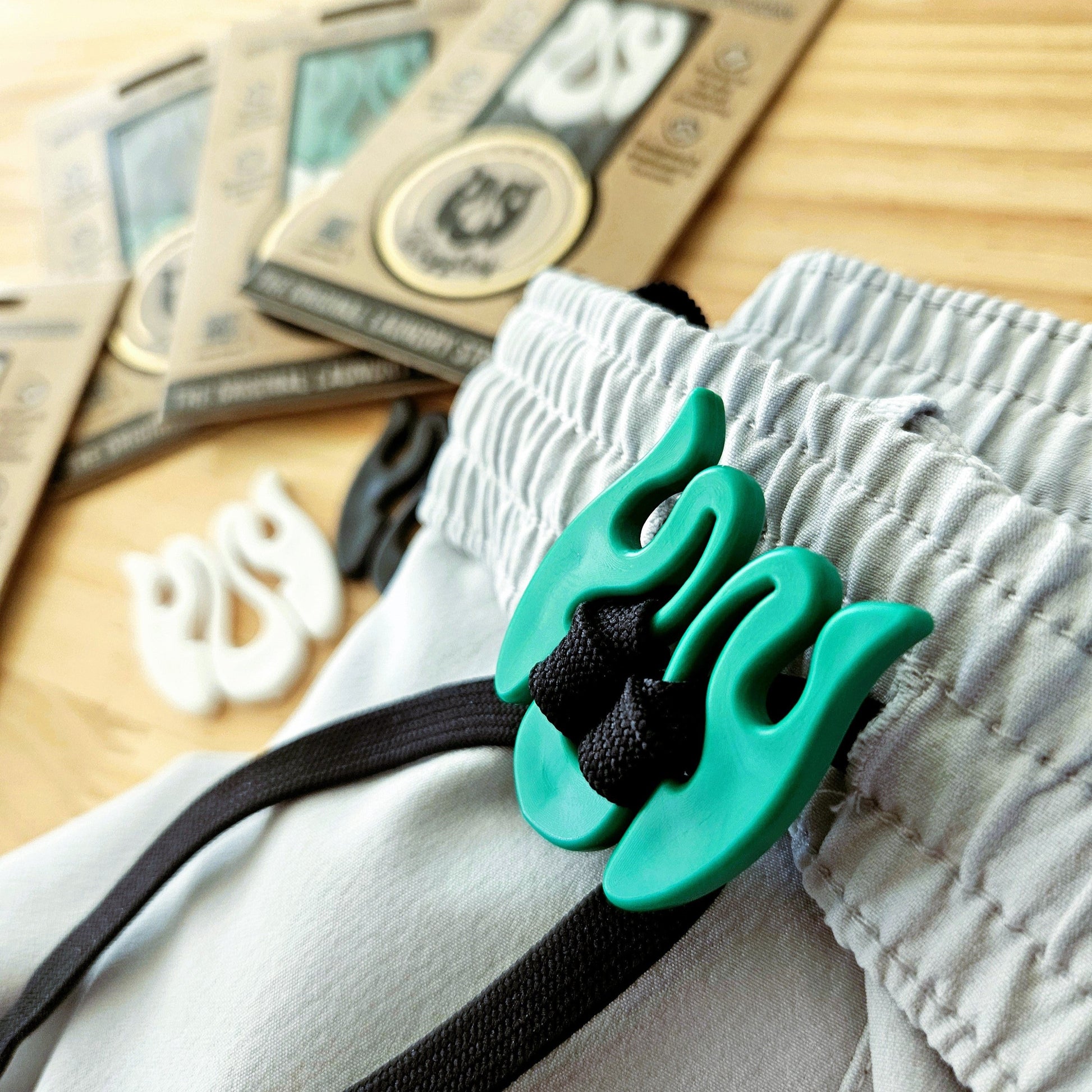Wiggley laundry string tie for hassle-free washing, reducing the need to rethread drawstrings.
